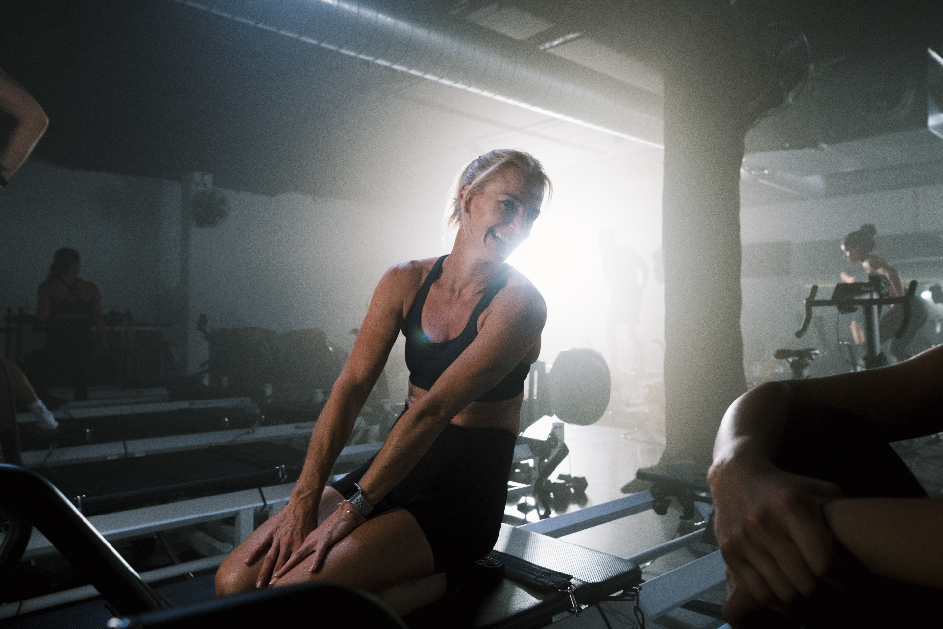 A member on a Rowformer in the STRONG Pilates studio